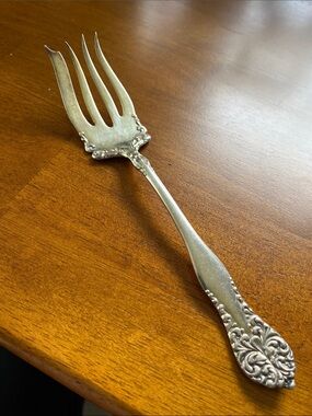 Ornate Silver-Tone Serving Fork with Floral Handle